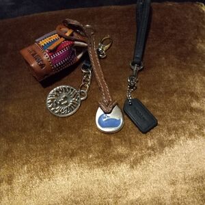 Four Various Purse Tags